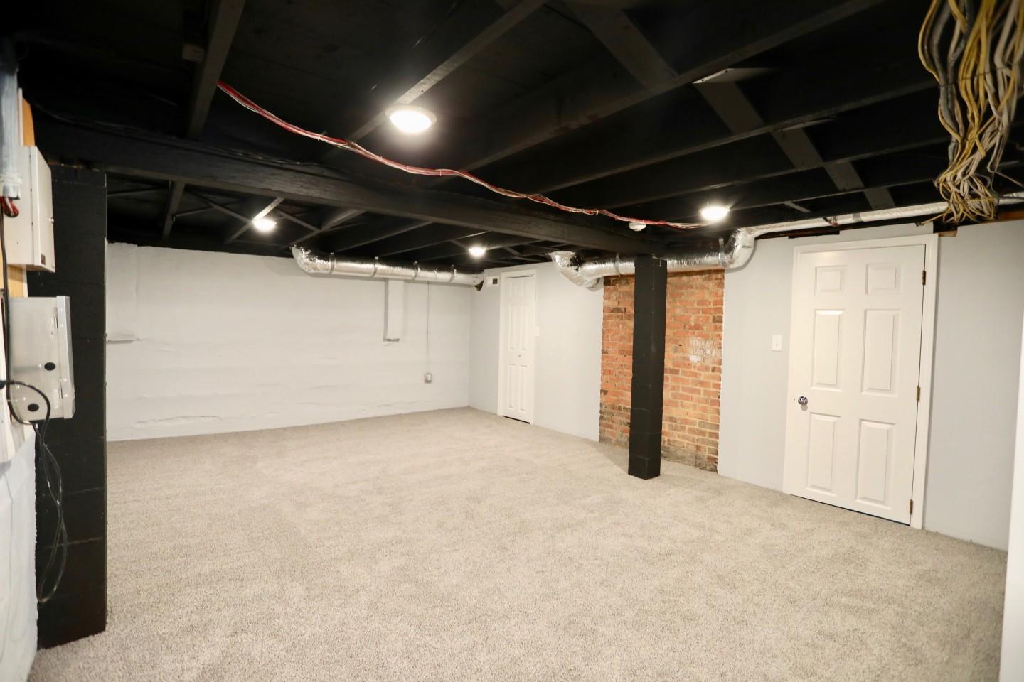 570 South Ridge Street Southern Pines, NC 28387 - Photo 30 of 44 570 SR BASEMENT REC ROOM