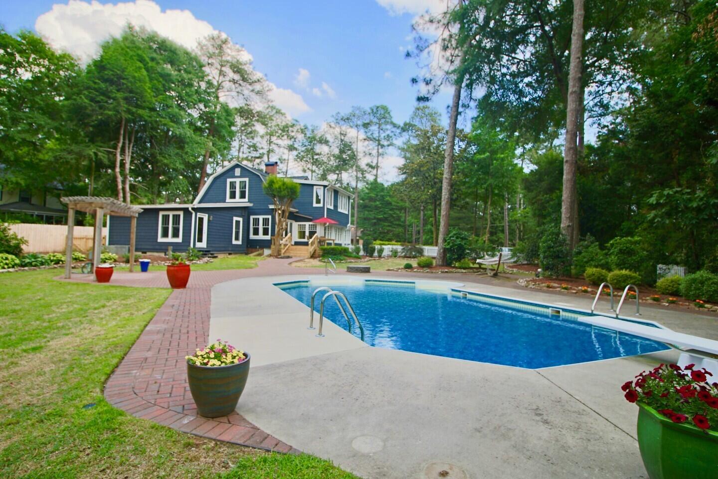 570 South Ridge Street Southern Pines, NC 28387 - Photo 35 of 44 570 SR POOL & BACK YARD **