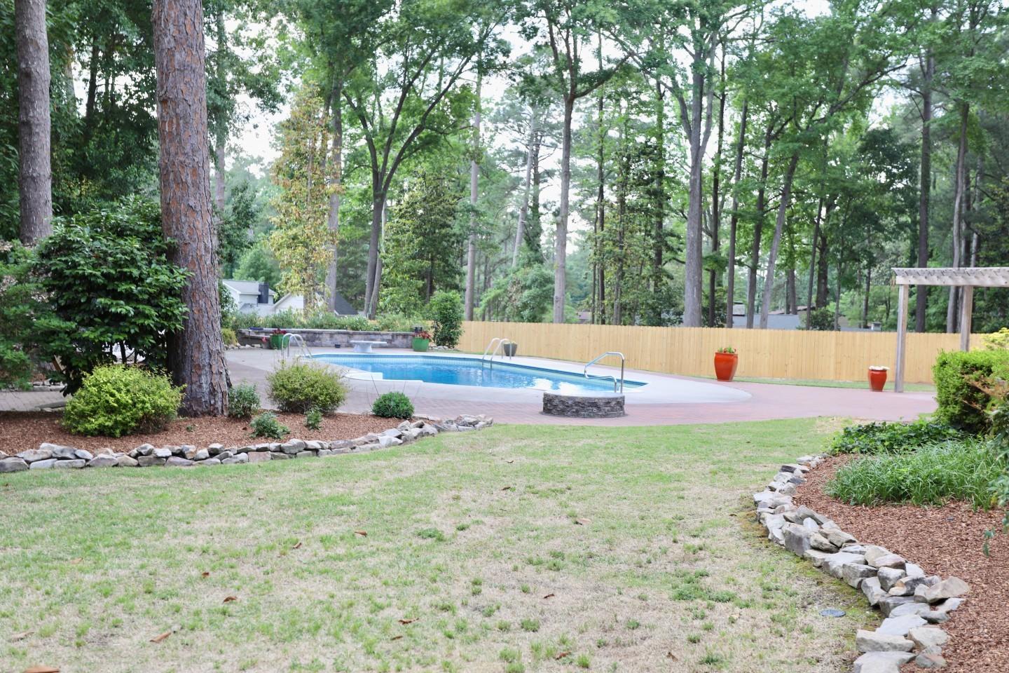 570 South Ridge Street Southern Pines, NC 28387 - Photo 37 of 44 570 SR POOL, YARD & FENCE