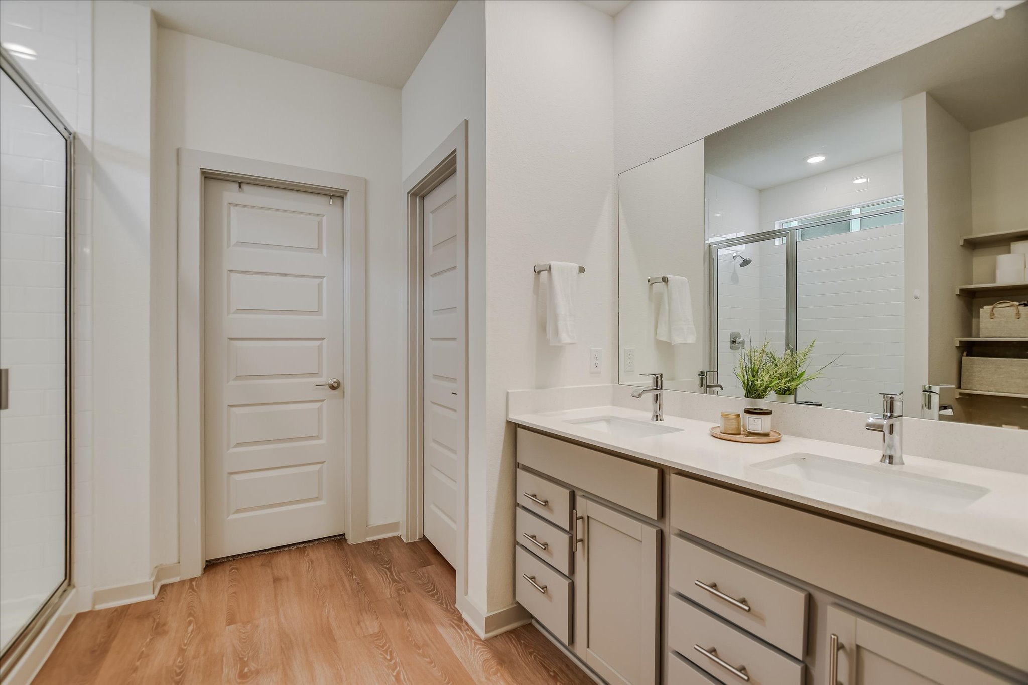 105 Merrick Road Georgetown, TX 78628 - Photo 10 of 23 Double vanity with clean lines and generous storage complements a modern bathroom design.