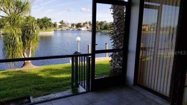 a view of swimming pool from a balcony