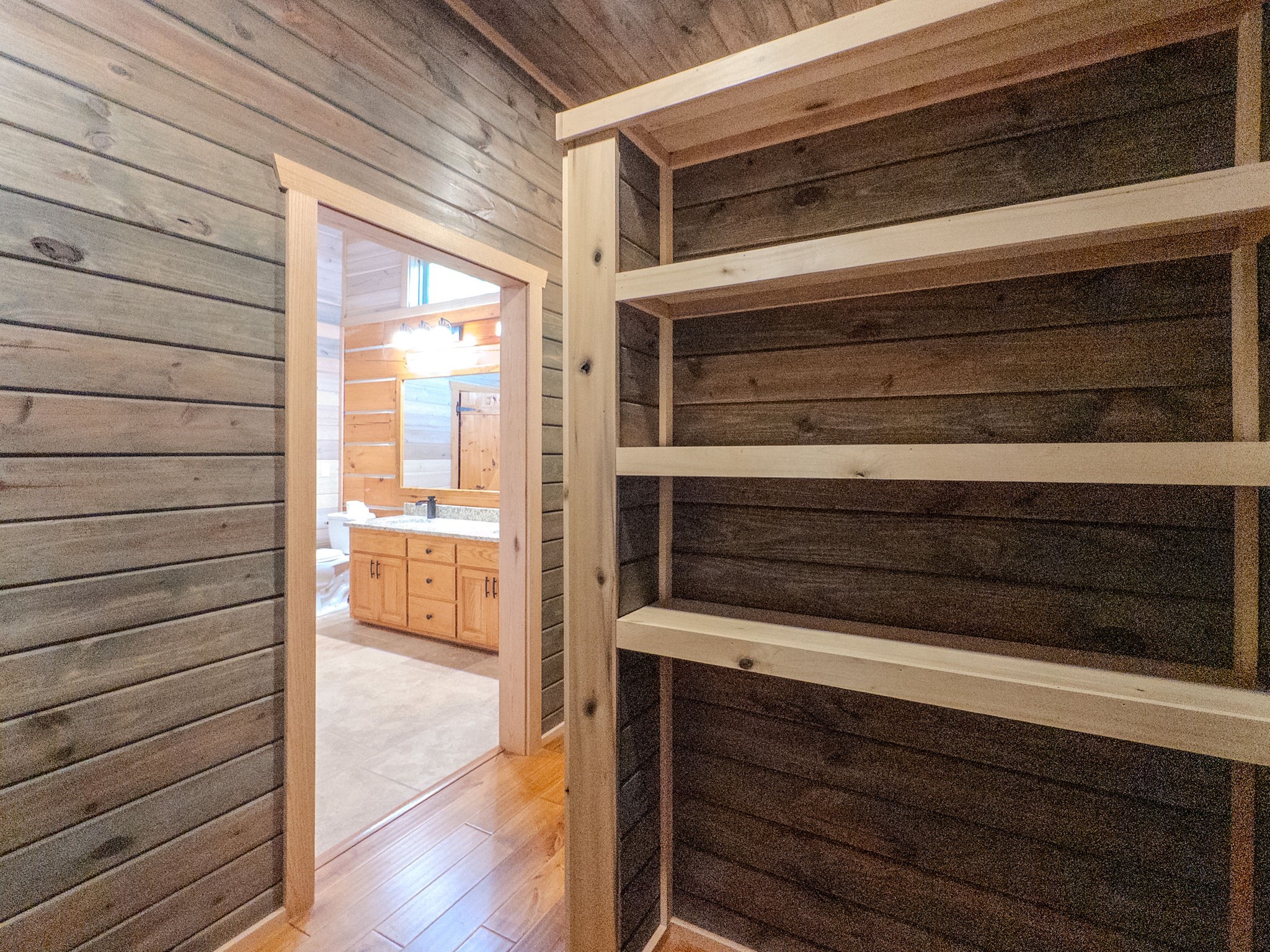 2909 B Beech Log Road Watertown, TN 37184 - Photo 24 of 67 a view of closet area with wooden floor
