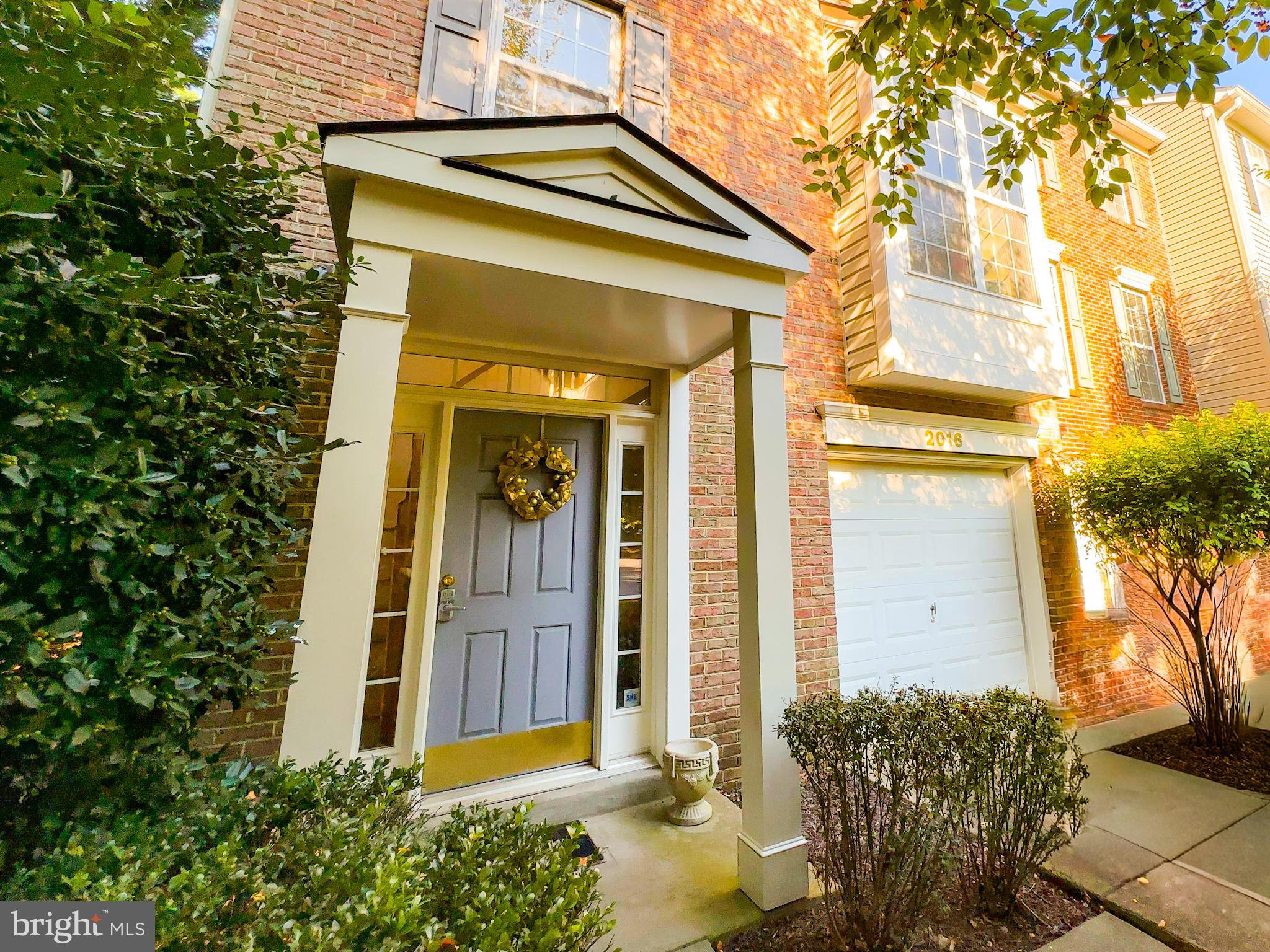 2016 Wheaton Haven Court Silver Spring, MD 20902 - Photo 8 of 8 a front view of a house with a yard