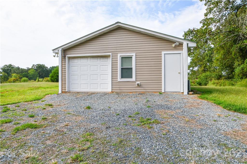 5920 Ra Austin Road Marshville, NC 28103 - Photo 22 of 22 a view of a house with a yard