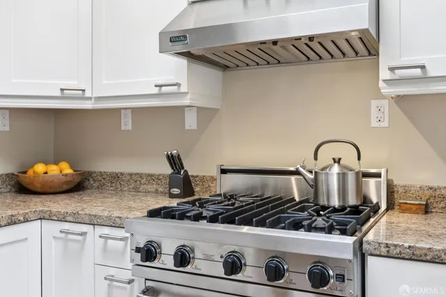 a bathroom with a sink mirror toilet and bathtub