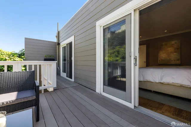a view of balcony with furniture and outdoor seating
