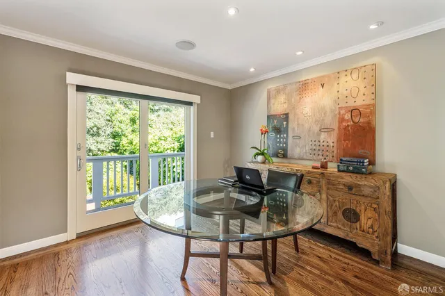 a view of a deck with furniture