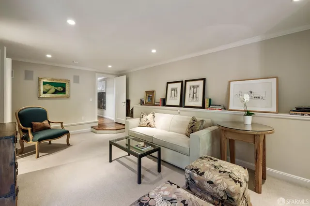 a kitchen with a sink a stove and cabinets