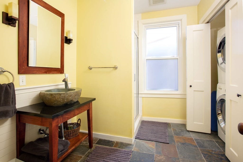 145 Salisbury Road, Unit 145 Brookline, MA 02445 - Photo 11 of 17 a bathroom with a sink and a mirror