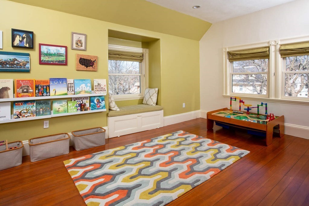 145 Salisbury Road, Unit 145 Brookline, MA 02445 - Photo 14 of 17 a bedroom with a bed and a couch