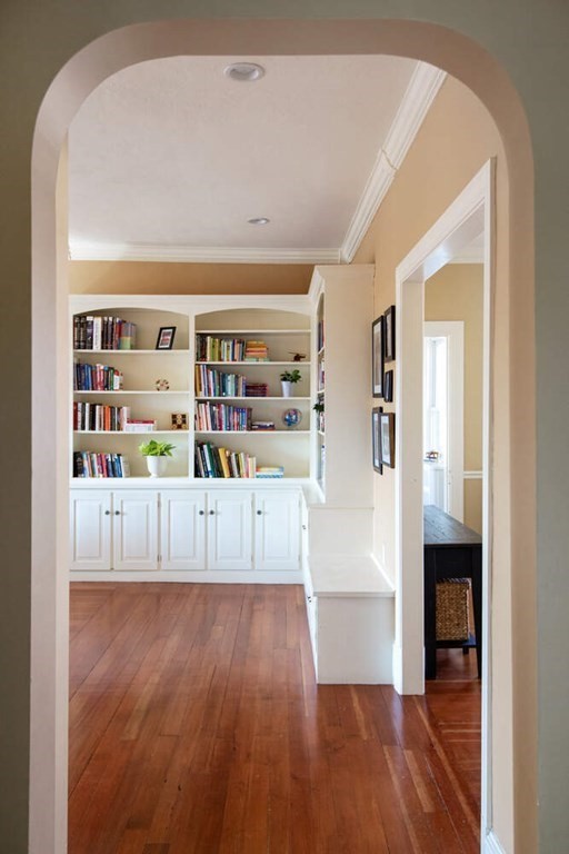145 Salisbury Road, Unit 145 Brookline, MA 02445 - Photo 3 of 17 a view of kitchen with furniture and wooden floor