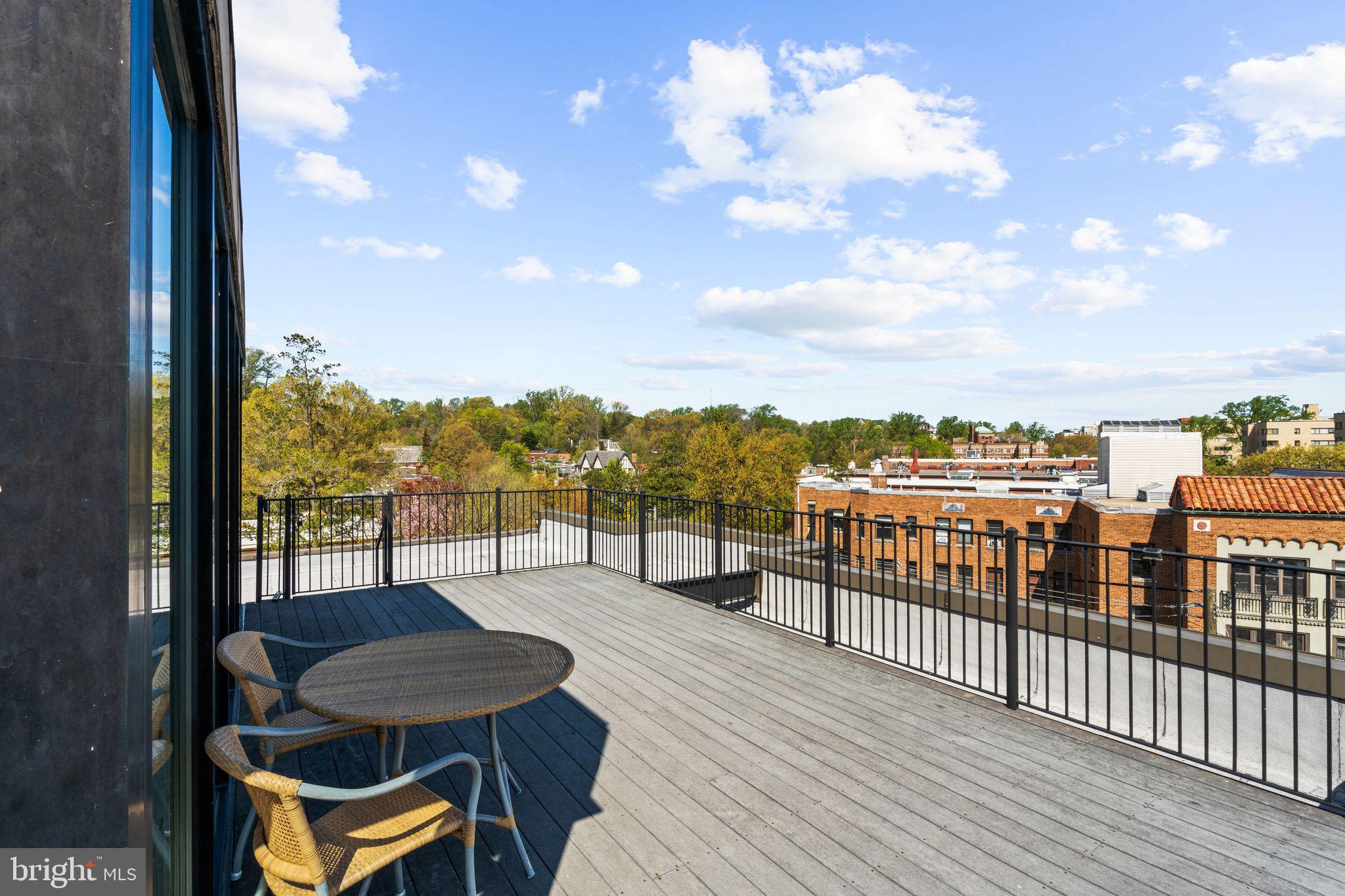 2902 Porter Street Northwest, Unit 43 Washington, DC 20008 - Photo 24 of 31 a view of a balcony with furniture