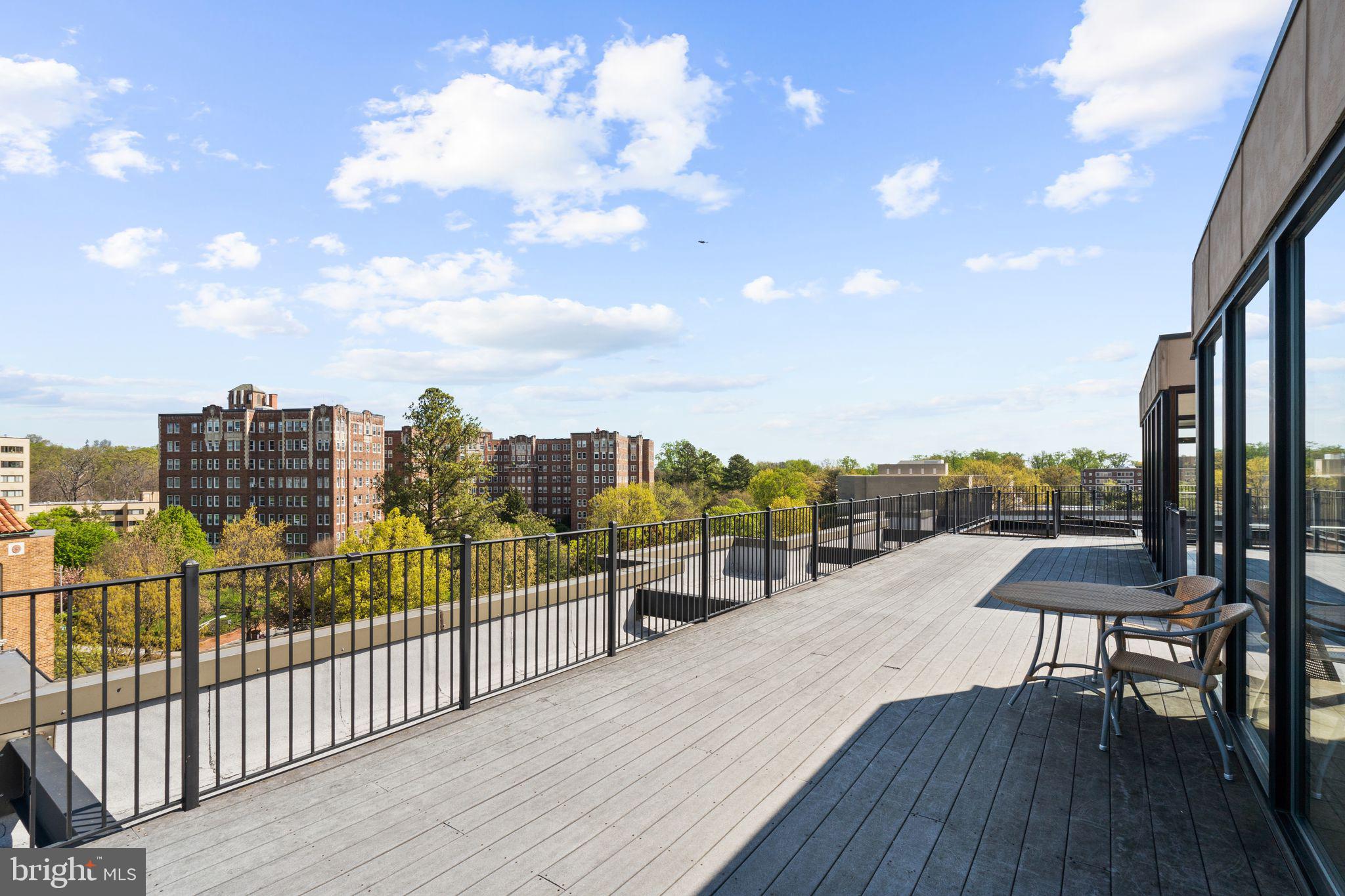 2902 Porter Street Northwest, Unit 43 Washington, DC 20008 - Photo 25 of 31 a view of a balcony with chairs