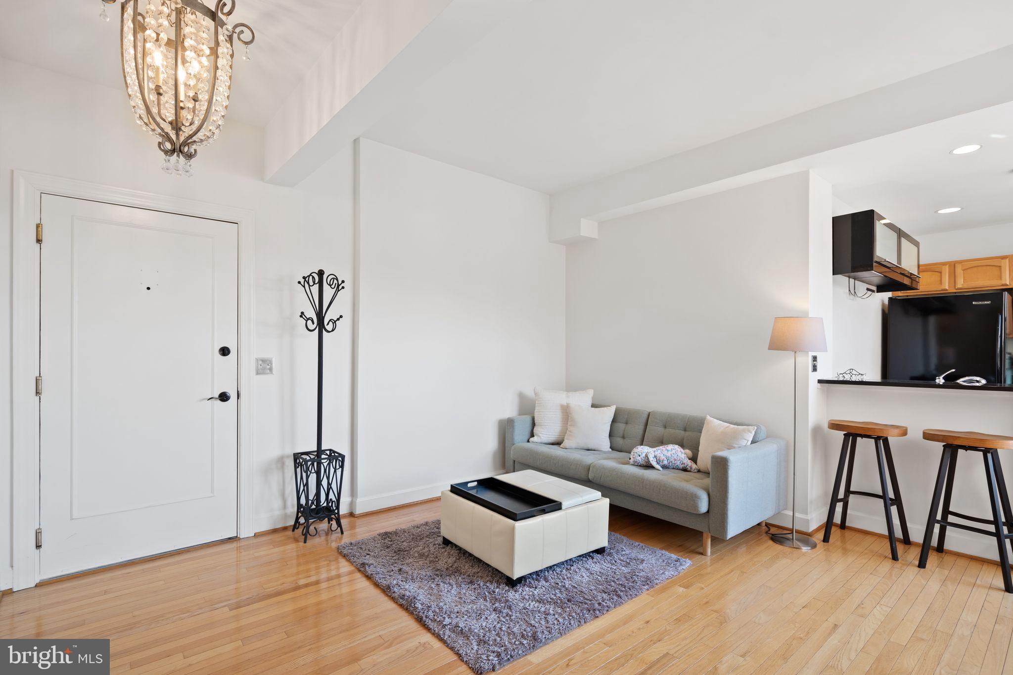 2902 Porter Street Northwest, Unit 43 Washington, DC 20008 - Photo 4 of 31 a living room with furniture