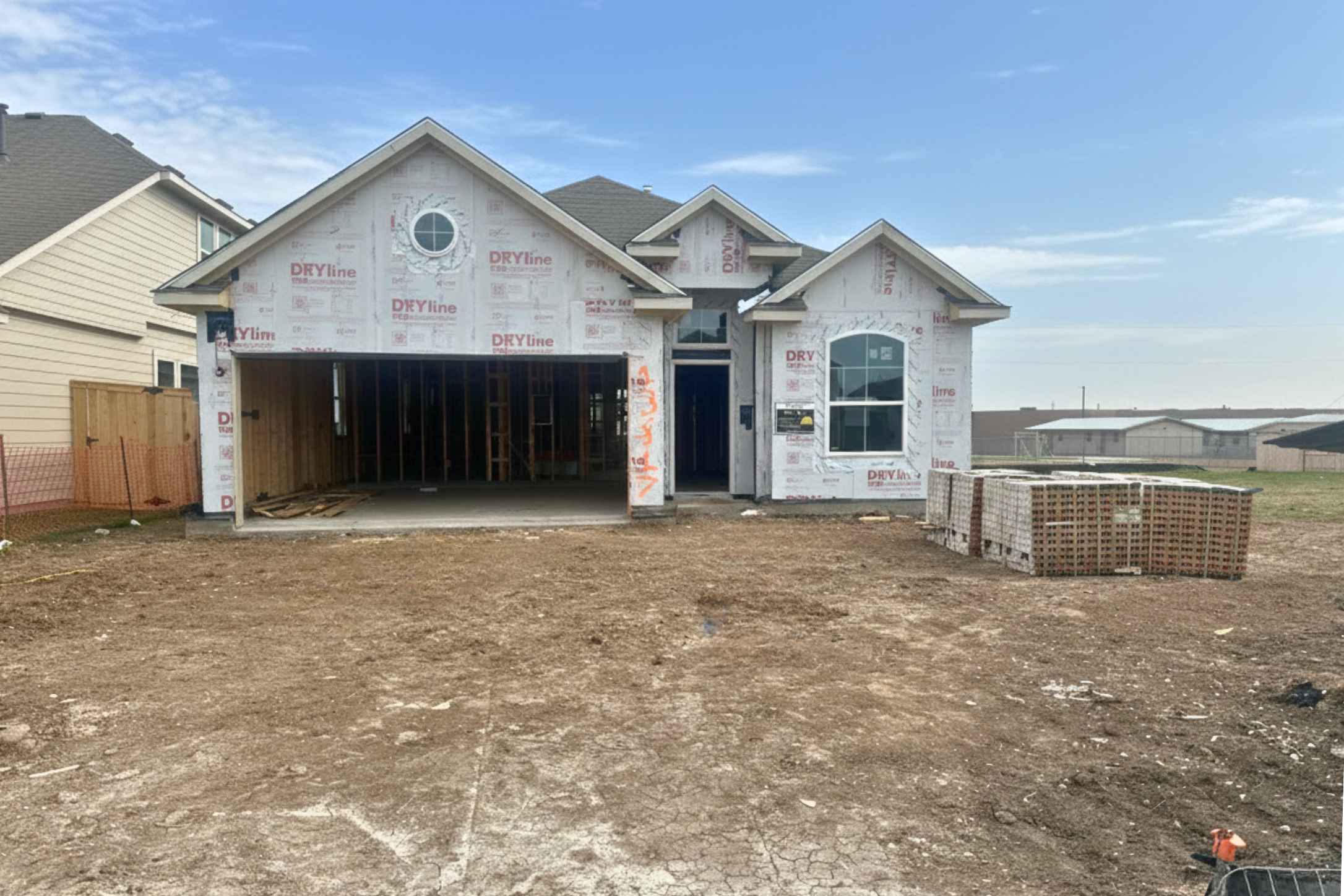 13817 Tucker Hedge Pass Elgin, TX 78621 - Photo 1 of 1 Property under construction featuring a garage and driveway