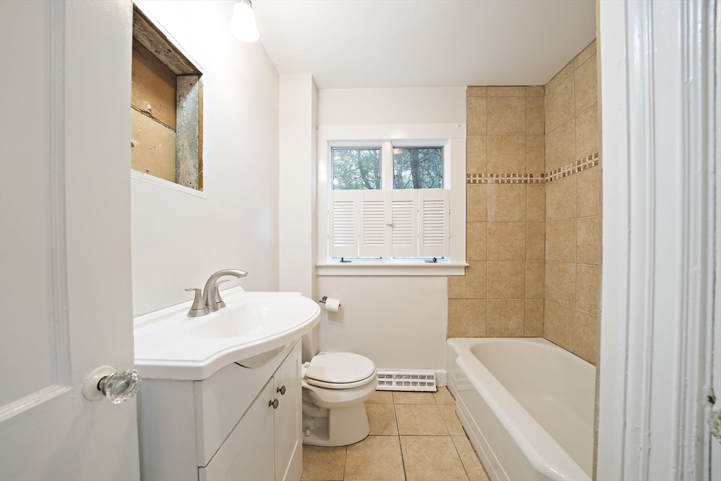 24 Sagamore Street Hamilton, MA 01982 - Photo 13 of 37 a bathroom with a sink toilet and shower