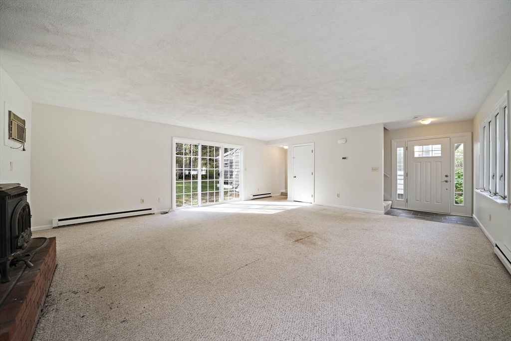 24 Sagamore Street Hamilton, MA 01982 - Photo 19 of 37 a view of an empty room with a window