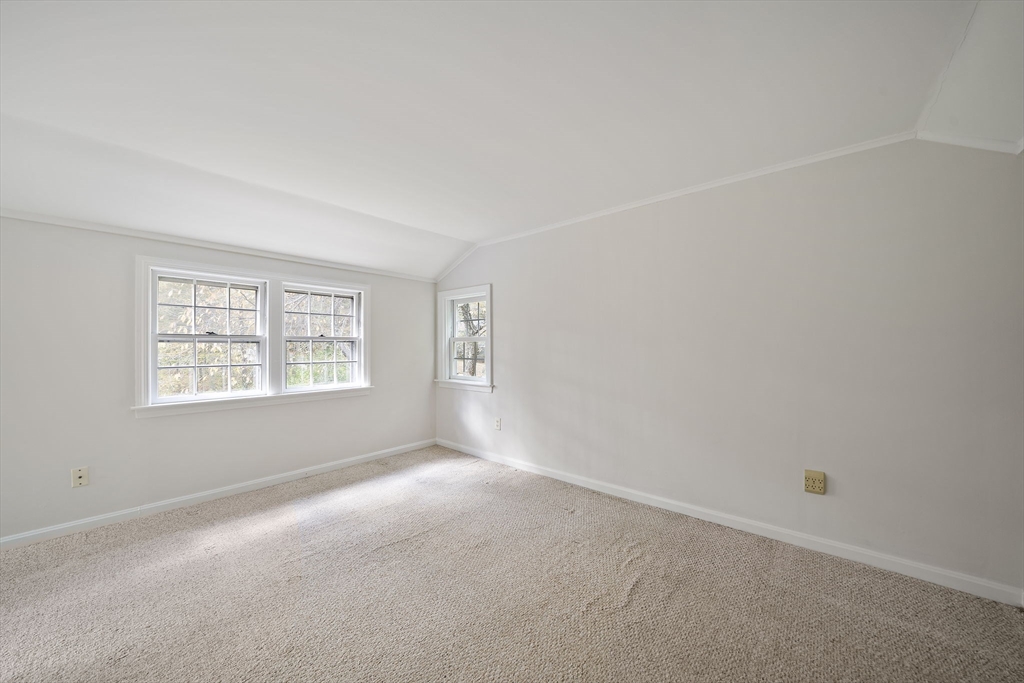 24 Sagamore Street Hamilton, MA 01982 - Photo 27 of 37 an empty room with a window