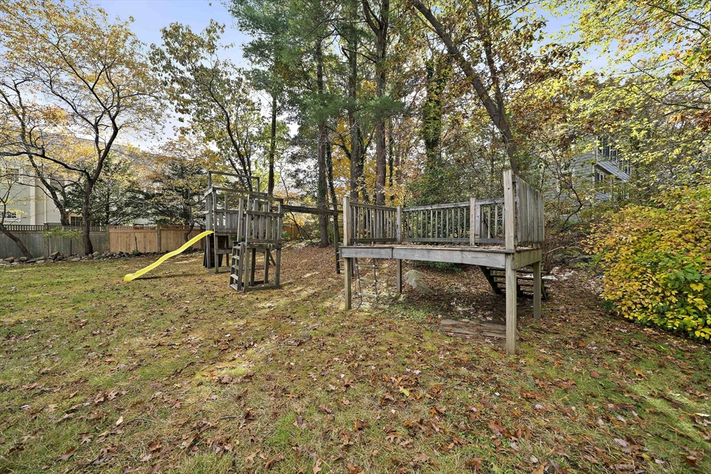 24 Sagamore Street Hamilton, MA 01982 - Photo 34 of 37 a backyard of a house with table and chairs