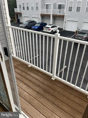 a view of balcony with stainless steel appliances