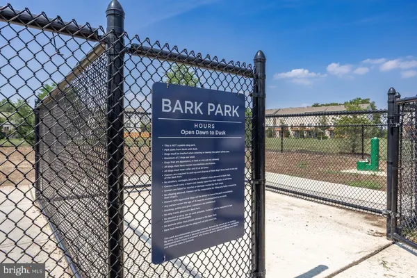 a view of a street with a building in the background
