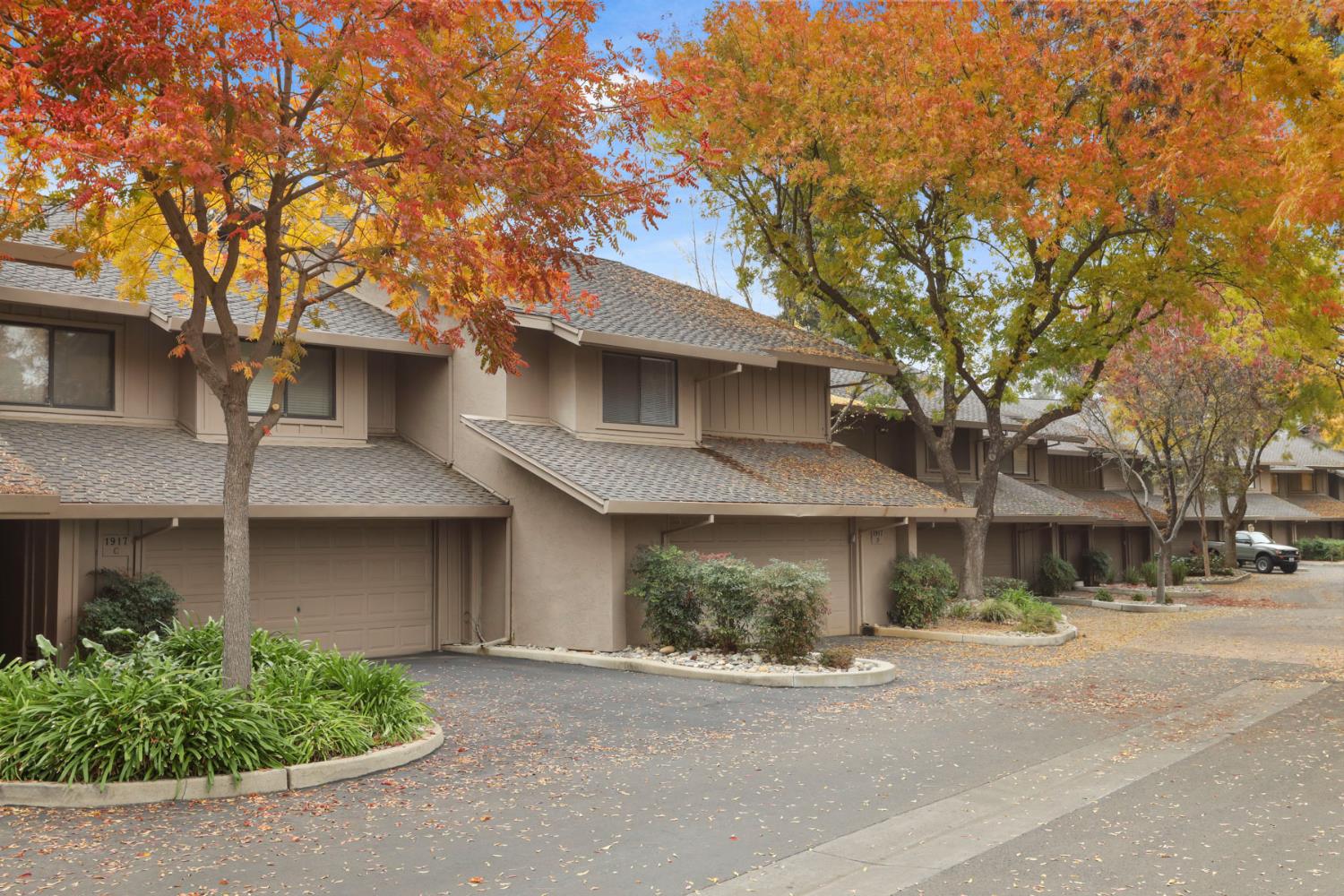 1917 Edgebrook Drive, Unit D Modesto, CA 95354 - Photo 3 of 58 front view of a house with a street