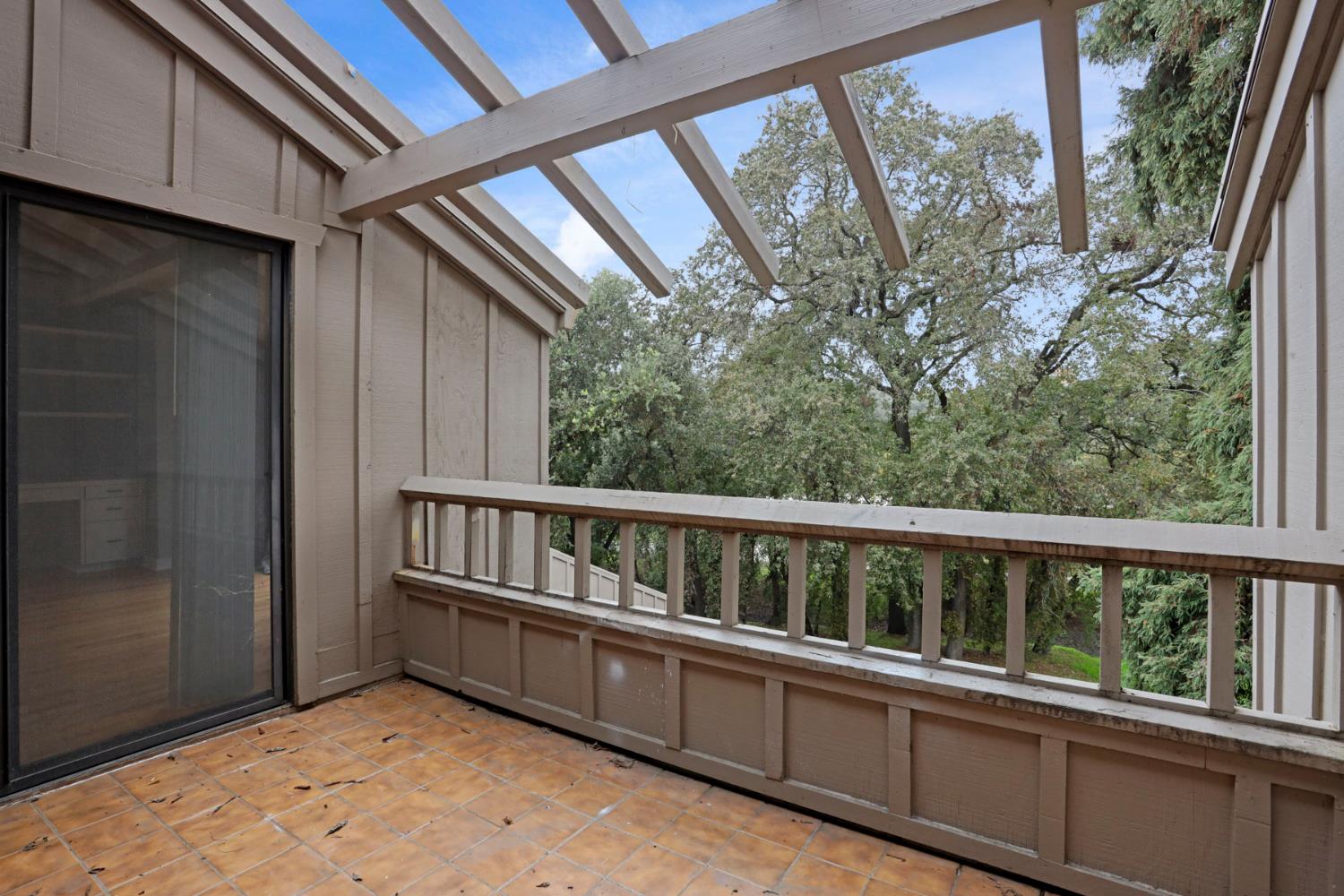 1917 Edgebrook Drive, Unit D Modesto, CA 95354 - Photo 44 of 58 a view of roof deck with furniture and trees around
