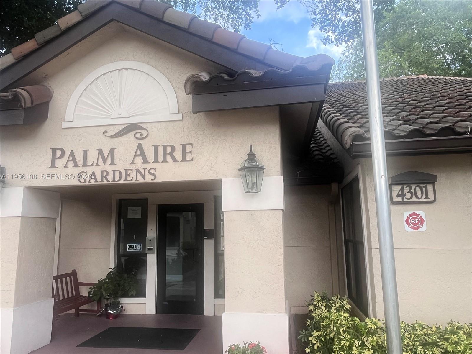 4281 West McNab Road, Unit 10 Pompano Beach, FL 33069 - Photo 12 of 16 a view of a entryway door of the building