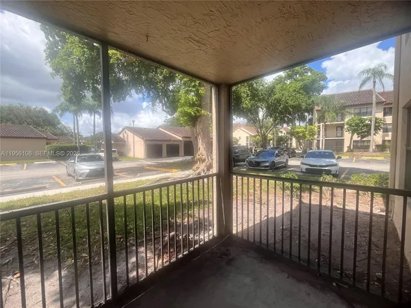 a view of a porch with a yard