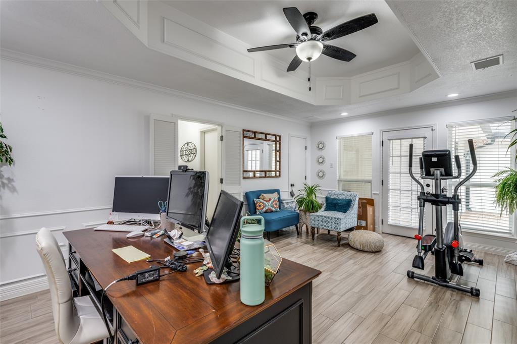 1301 Davis Lane Terrell, TX 75160 - Photo 20 of 37 a work room with furniture and wooden floor