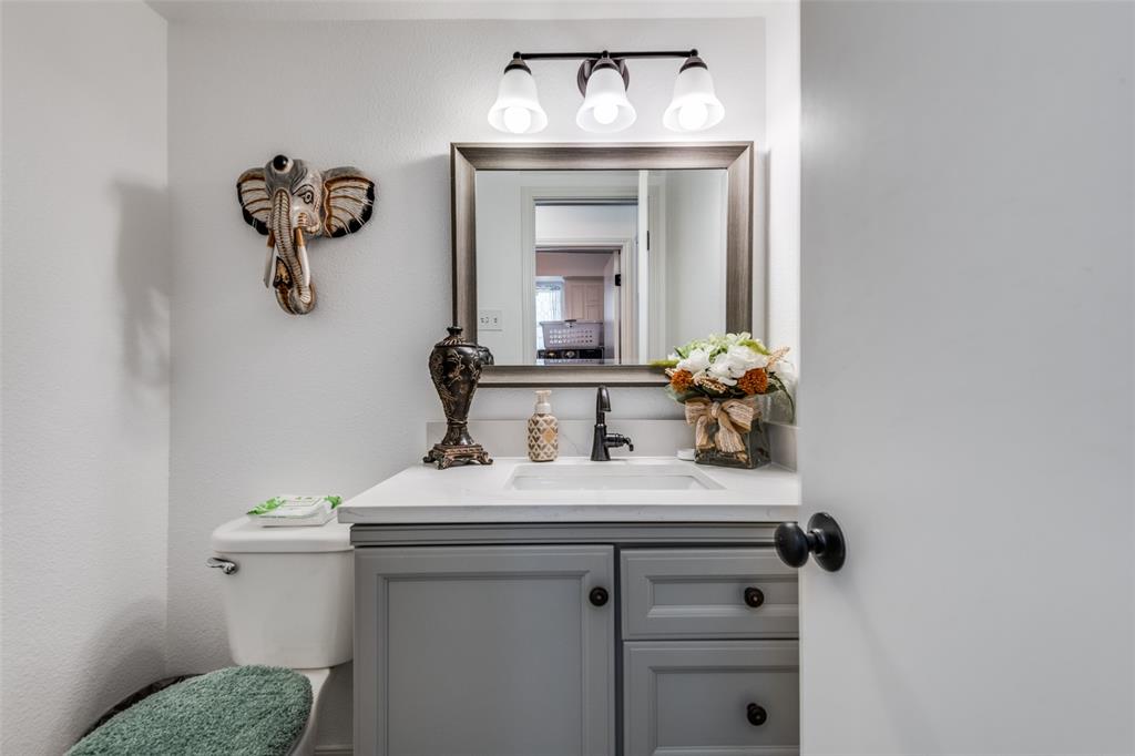 1301 Davis Lane Terrell, TX 75160 - Photo 21 of 37 a bathroom with a sink and a mirror