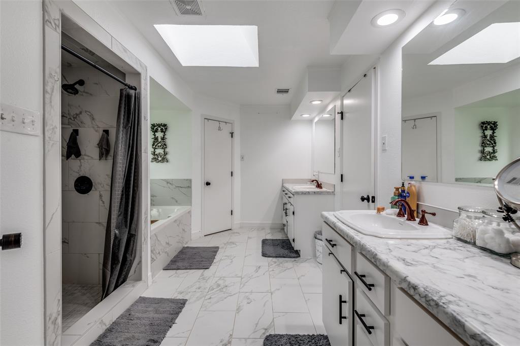 1301 Davis Lane Terrell, TX 75160 - Photo 27 of 37 a bathroom with a sink a toilet and shower
