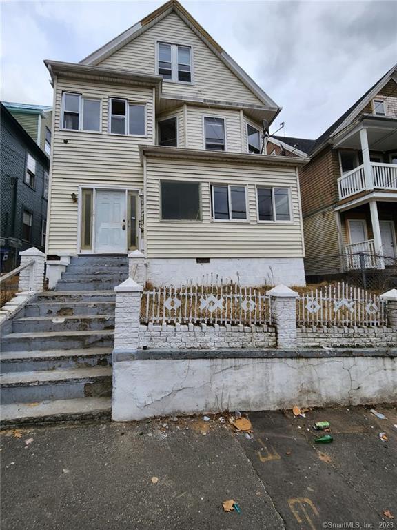 146 Chestnut Avenue Waterbury, CT 06710 - Photo 1 of 1 a view of a house with a balcony