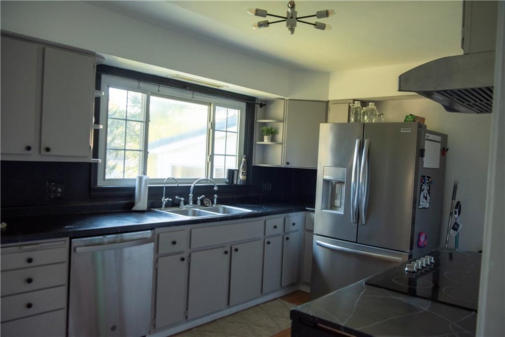 10395 Highway 85 Kittanning, PA 16201 - Photo 14 of 34 a kitchen with a sink appliances and cabinets