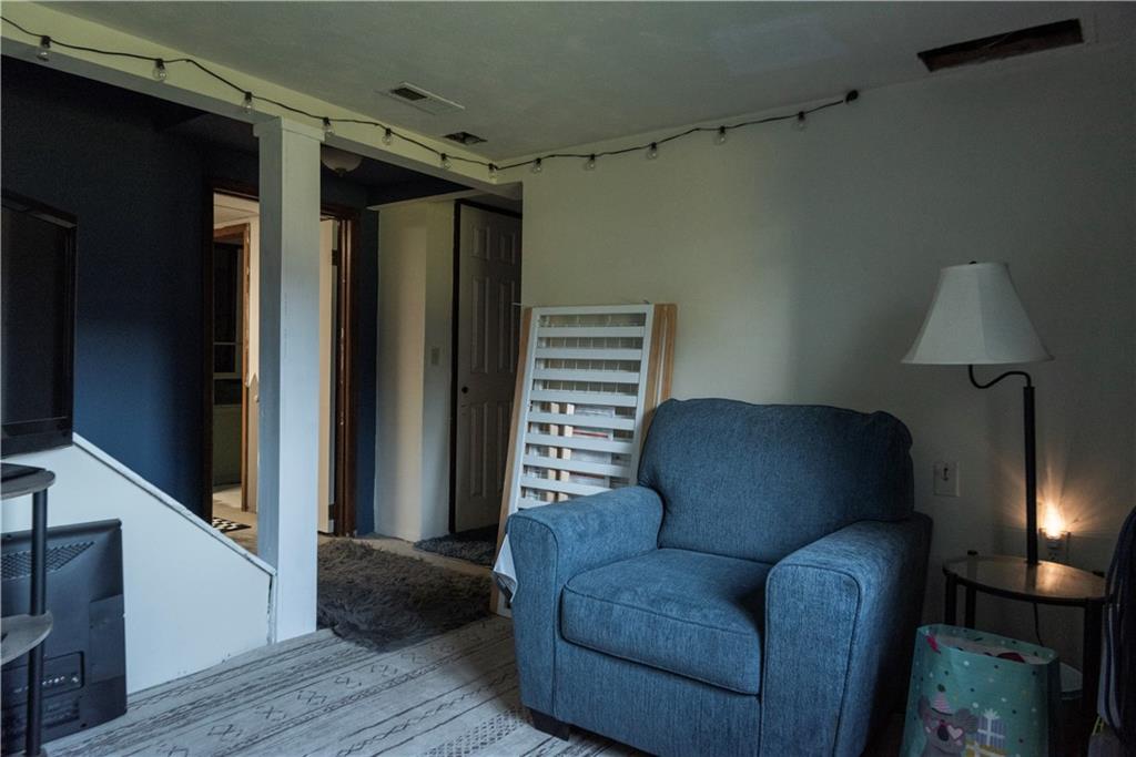 10395 Highway 85 Kittanning, PA 16201 - Photo 23 of 34 a living room with furniture and a window