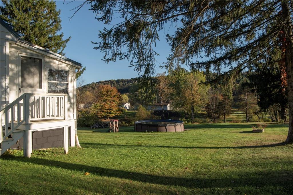 10395 Highway 85 Kittanning, PA 16201 - Photo 9 of 34 front view of house with a yard