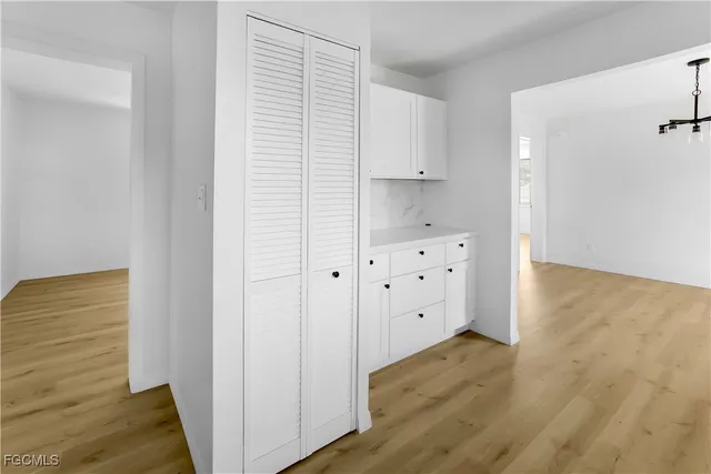 a view of kitchen with wooden floor