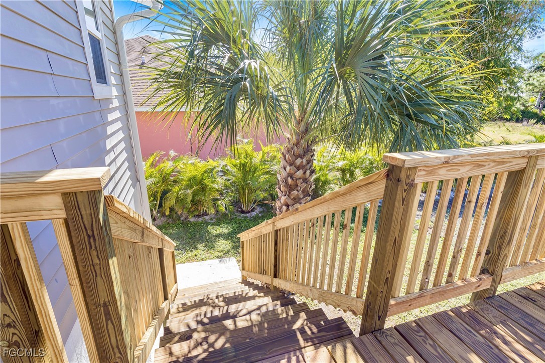 10697 Holly Road Bokeelia, FL 33922 - Photo 20 of 50 a view of a backyard with pathway