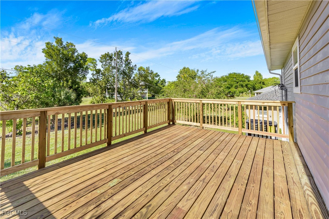 10697 Holly Road Bokeelia, FL 33922 - Photo 23 of 50 a view of outdoor space with wooden floor