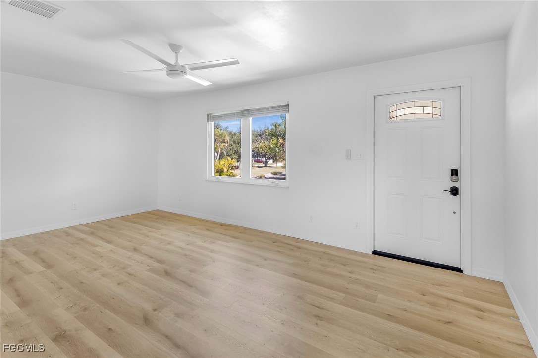 10697 Holly Road Bokeelia, FL 33922 - Photo 50 of 50 a view of an empty room with a window