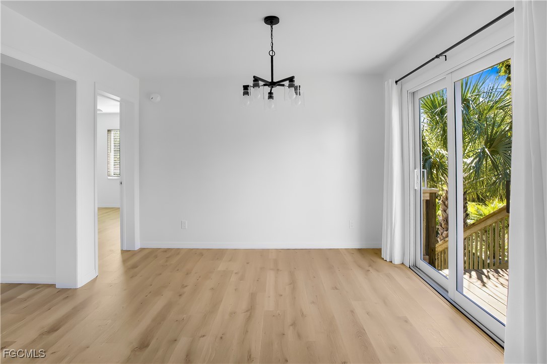 10697 Holly Road Bokeelia, FL 33922 - Photo 6 of 50 a view of room with window