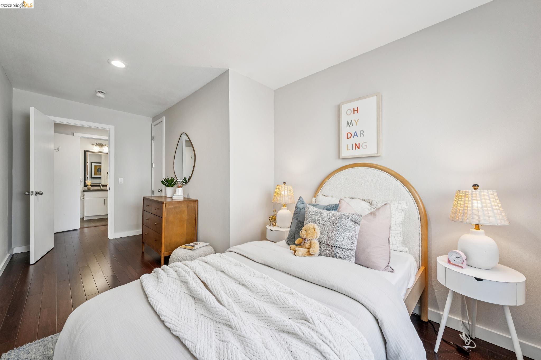 1394 Queens Road Berkeley, CA 94708 - Photo 54 of 63 Recessed ceiling lighting, wood-finish flooring, light-toned wall paint, and a built-in closet with bifold doors