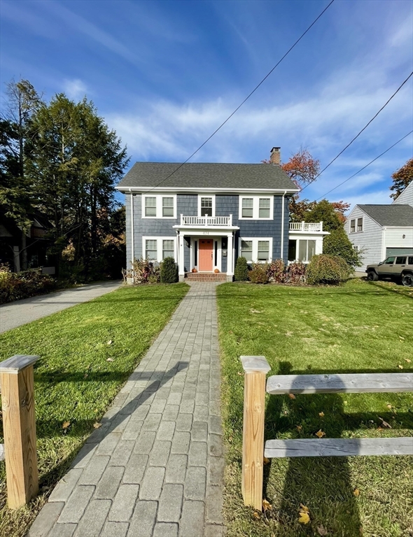 424 Brook Road Milton, MA 02186 - Photo 35 of 41 a front view of a house with a yard