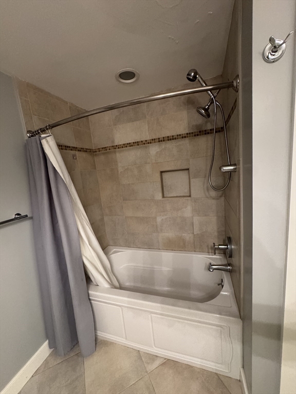 491 Dutton Street, Unit 504 Lowell, MA 01854 - Photo 16 of 16 a bathroom with a shower