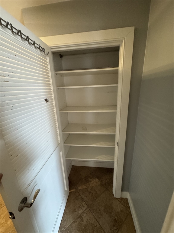 491 Dutton Street, Unit 504 Lowell, MA 01854 - Photo 8 of 16 a view of walk in closet