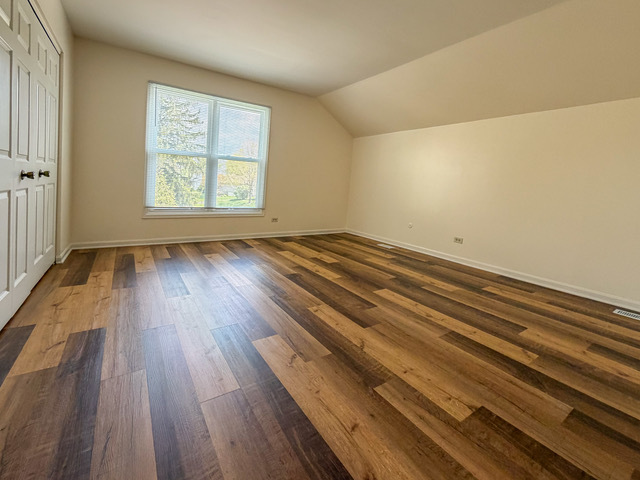 5090 Prairie Oak Road Gurnee, IL 60031 - Photo 14 of 30 wooden floor in an empty room