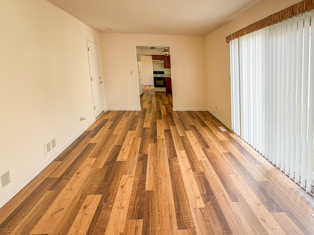 5090 Prairie Oak Road Gurnee, IL 60031 - Photo 16 of 30 a view of wooden floor in a room