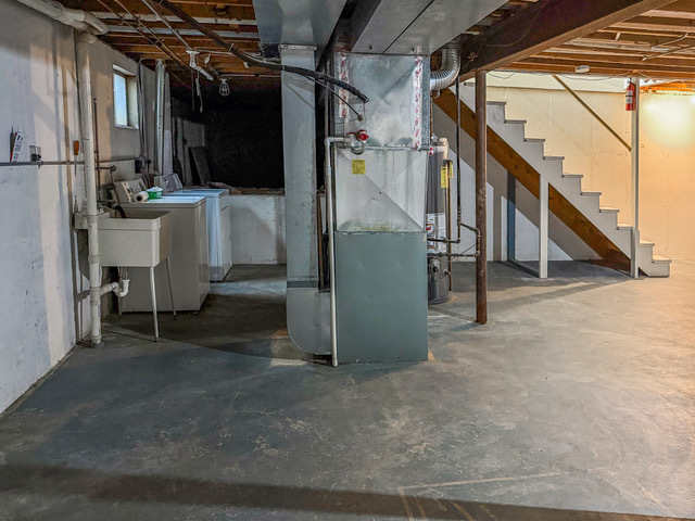 5090 Prairie Oak Road Gurnee, IL 60031 - Photo 20 of 30 a view of a storage room with stairs