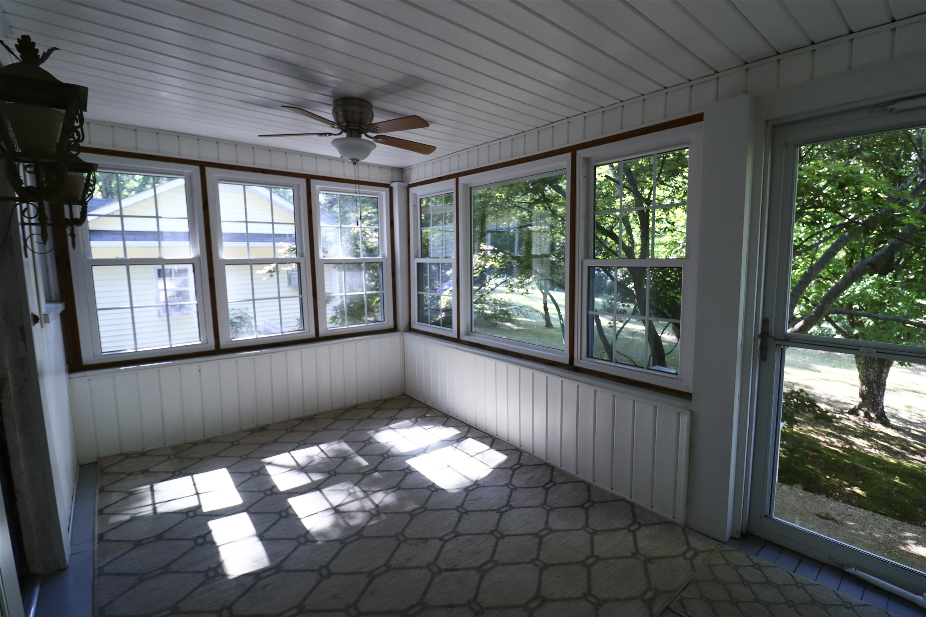 317 Purdy Road Selmer, TN 38375 - Photo 13 of 38 Unfurnished sunroom featuring ceiling fan and a healthy amount of sunlight