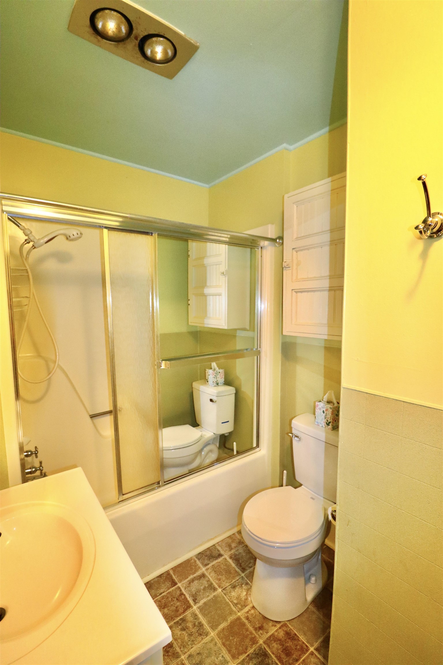 317 Purdy Road Selmer, TN 38375 - Photo 29 of 38 Full bathroom with vanity, toilet, tile patterned floors, and bath / shower combo with glass door